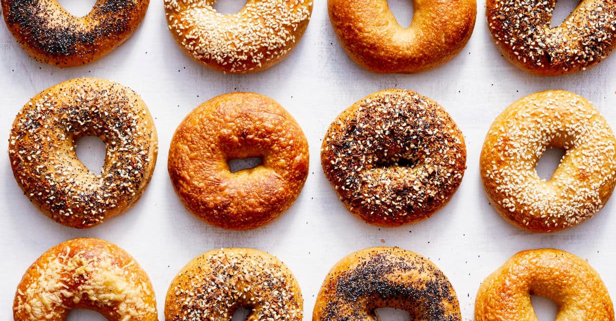 Freshly baked bagels stacked high